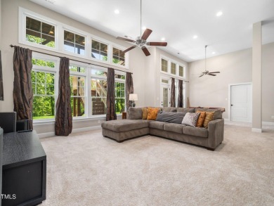 Step into refined luxury with this 6 bed / 5 bath estate on TPC at Wakefield Plantation in North Carolina - for sale on GolfHomes.com, golf home, golf lot