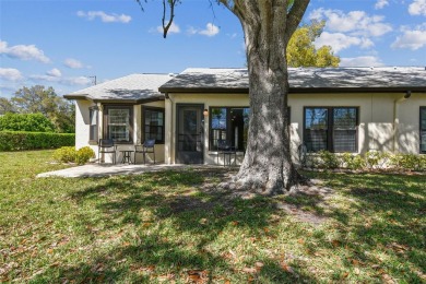 Step into Florida living at its finest with this beautifully on Highland Lakes Executive Golf Course in Florida - for sale on GolfHomes.com, golf home, golf lot