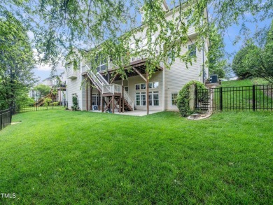 Step into refined luxury with this 6 bed / 5 bath estate on TPC at Wakefield Plantation in North Carolina - for sale on GolfHomes.com, golf home, golf lot