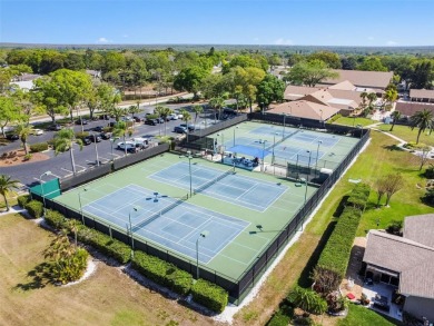 Step into Florida living at its finest with this beautifully on Highland Lakes Executive Golf Course in Florida - for sale on GolfHomes.com, golf home, golf lot