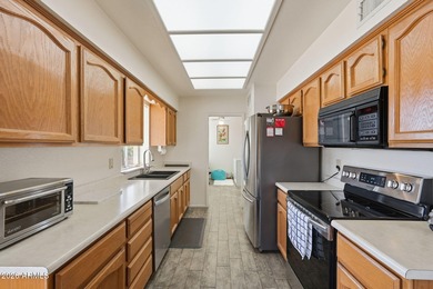 Welcome to a bright and inviting 2-bed, 2 FULL bath home nestled on Sunland Village East Golf Course in Arizona - for sale on GolfHomes.com, golf home, golf lot