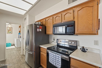 Welcome to a bright and inviting 2-bed, 2 FULL bath home nestled on Sunland Village East Golf Course in Arizona - for sale on GolfHomes.com, golf home, golf lot