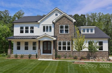 Come and enjoy your new grand home nestled on a gently sloped on Rock Barn Golf and Spa in North Carolina - for sale on GolfHomes.com, golf home, golf lot