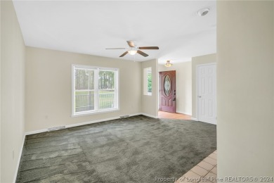 MOVE IN READY HOME WITH A VIEW OF THE DRIVING RANGE , 10TH HOLE on Quail Ridge Golf Course in North Carolina - for sale on GolfHomes.com, golf home, golf lot