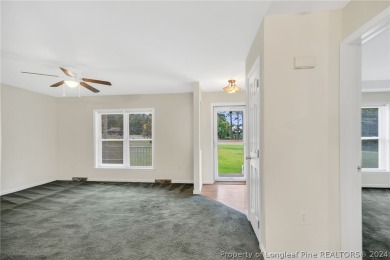 MOVE IN READY HOME WITH A VIEW OF THE DRIVING RANGE , 10TH HOLE on Quail Ridge Golf Course in North Carolina - for sale on GolfHomes.com, golf home, golf lot