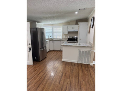 Welcome to this charming and well-maintained 2-bedroom, 2-bath on The Meadows At Countrywood in Florida - for sale on GolfHomes.com, golf home, golf lot