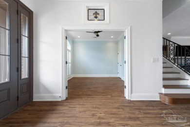 Discover this beautiful 5-bedroom, 5-bath single-family home on Tiger Point Golf and Country Club in Florida - for sale on GolfHomes.com, golf home, golf lot
