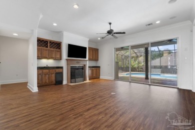 Discover this beautiful 5-bedroom, 5-bath single-family home on Tiger Point Golf and Country Club in Florida - for sale on GolfHomes.com, golf home, golf lot