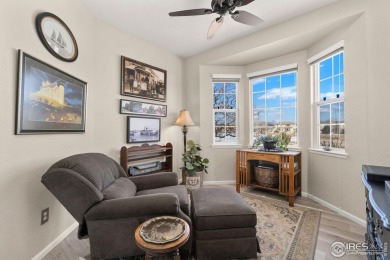 Welcome to 13832 Legend Way 102. This elegant residence offers a on The Broadlands Golf Course in Colorado - for sale on GolfHomes.com, golf home, golf lot