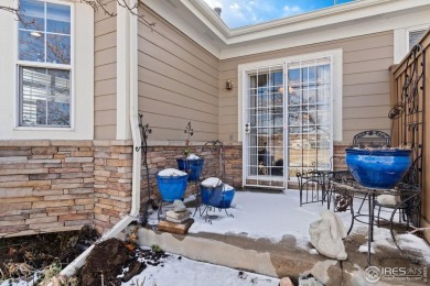 Welcome to 13832 Legend Way 102. This elegant residence offers a on The Broadlands Golf Course in Colorado - for sale on GolfHomes.com, golf home, golf lot