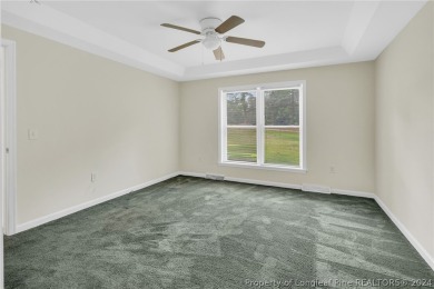 MOVE IN READY HOME WITH A VIEW OF THE DRIVING RANGE , 10TH HOLE on Quail Ridge Golf Course in North Carolina - for sale on GolfHomes.com, golf home, golf lot