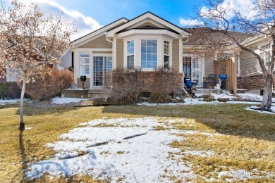 Welcome to 13832 Legend Way 102. This elegant residence offers a on The Broadlands Golf Course in Colorado - for sale on GolfHomes.com, golf home, golf lot