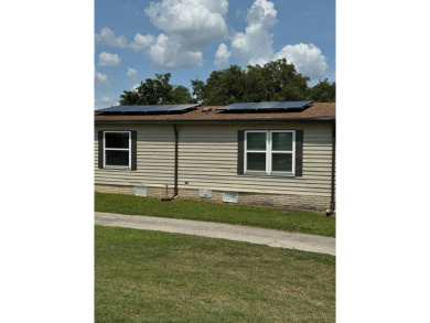Welcome to this charming and well-maintained 2-bedroom, 2-bath on The Meadows At Countrywood in Florida - for sale on GolfHomes.com, golf home, golf lot
