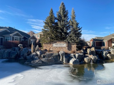 Welcome to 13832 Legend Way 102. This elegant residence offers a on The Broadlands Golf Course in Colorado - for sale on GolfHomes.com, golf home, golf lot