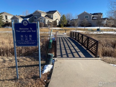 Welcome to 13832 Legend Way 102. This elegant residence offers a on The Broadlands Golf Course in Colorado - for sale on GolfHomes.com, golf home, golf lot