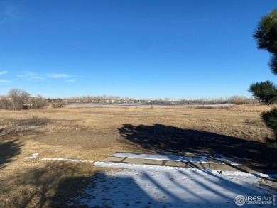 Welcome to 13832 Legend Way 102. This elegant residence offers a on The Broadlands Golf Course in Colorado - for sale on GolfHomes.com, golf home, golf lot