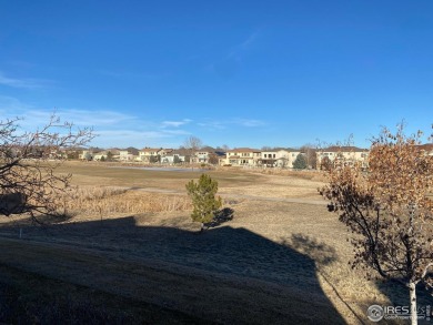 Welcome to 13832 Legend Way 102. This elegant residence offers a on The Broadlands Golf Course in Colorado - for sale on GolfHomes.com, golf home, golf lot