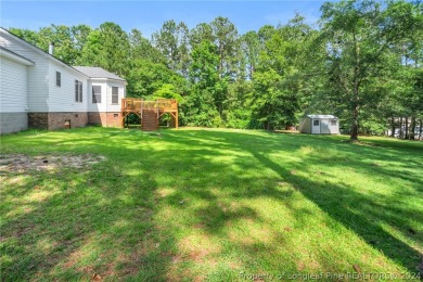 MOVE IN READY HOME WITH A VIEW OF THE DRIVING RANGE , 10TH HOLE on Quail Ridge Golf Course in North Carolina - for sale on GolfHomes.com, golf home, golf lot