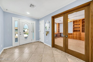 This exceptional custom Sun City home is ideally positioned on Sun City South Golf Course in Arizona - for sale on GolfHomes.com, golf home, golf lot