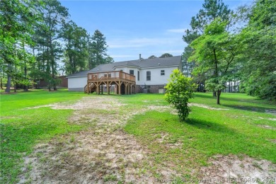 MOVE IN READY HOME WITH A VIEW OF THE DRIVING RANGE , 10TH HOLE on Quail Ridge Golf Course in North Carolina - for sale on GolfHomes.com, golf home, golf lot