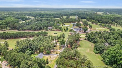 MOVE IN READY HOME WITH A VIEW OF THE DRIVING RANGE , 10TH HOLE on Quail Ridge Golf Course in North Carolina - for sale on GolfHomes.com, golf home, golf lot