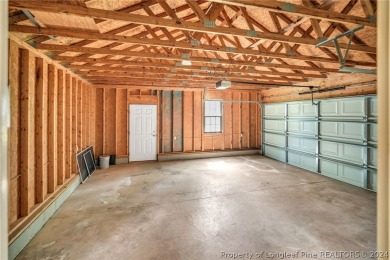 MOVE IN READY HOME WITH A VIEW OF THE DRIVING RANGE , 10TH HOLE on Quail Ridge Golf Course in North Carolina - for sale on GolfHomes.com, golf home, golf lot