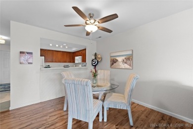 This beautiful 2-bedroom, 2-bath furnished end unit condominium on Seasons Ridge At Four Seasons in Missouri - for sale on GolfHomes.com, golf home, golf lot