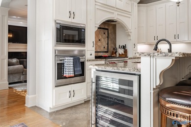 This luxury home overlooks the #4 fairway of Canebrake with a on Canebrake Golf Club in Alabama - for sale on GolfHomes.com, golf home, golf lot