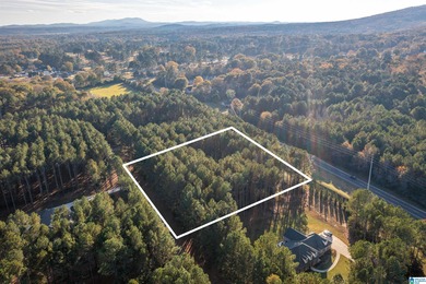 Discover your dream homesite on this expansive 2.35-acre estate on Pine Hill Country Club in Alabama - for sale on GolfHomes.com, golf home, golf lot