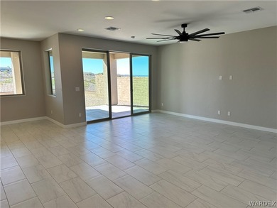 Welcome to your dream home in the prestigious Laughlin Ranch on Laughlin Ranch Golf Club in Arizona - for sale on GolfHomes.com, golf home, golf lot