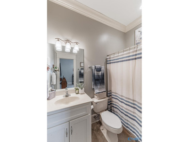 This luxury home overlooks the #4 fairway of Canebrake with a on Canebrake Golf Club in Alabama - for sale on GolfHomes.com, golf home, golf lot