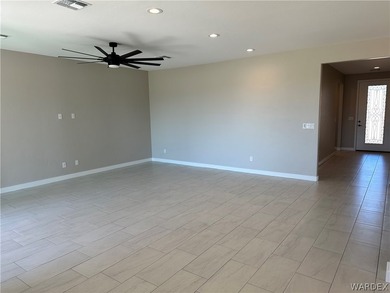 Welcome to your dream home in the prestigious Laughlin Ranch on Laughlin Ranch Golf Club in Arizona - for sale on GolfHomes.com, golf home, golf lot