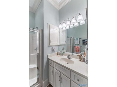 This luxury home overlooks the #4 fairway of Canebrake with a on Canebrake Golf Club in Alabama - for sale on GolfHomes.com, golf home, golf lot