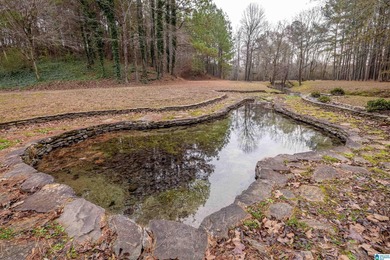 Discover your dream homesite on this expansive 2.35-acre estate on Pine Hill Country Club in Alabama - for sale on GolfHomes.com, golf home, golf lot