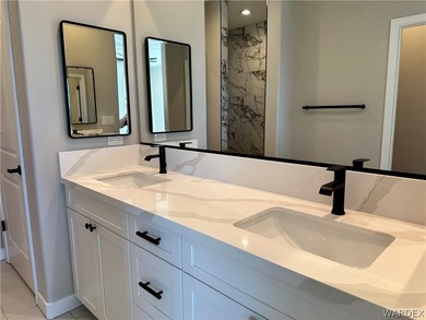 Welcome to your dream home in the prestigious Laughlin Ranch on Laughlin Ranch Golf Club in Arizona - for sale on GolfHomes.com, golf home, golf lot