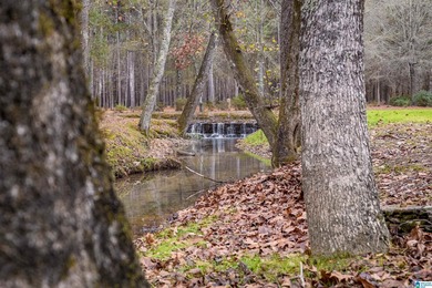 Discover your dream homesite on this expansive 2.35-acre estate on Pine Hill Country Club in Alabama - for sale on GolfHomes.com, golf home, golf lot