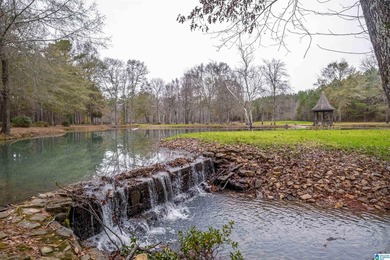 Discover your dream homesite on this expansive 2.35-acre estate on Pine Hill Country Club in Alabama - for sale on GolfHomes.com, golf home, golf lot