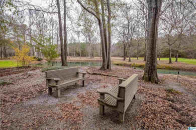 Discover your dream homesite on this expansive 2.35-acre estate on Pine Hill Country Club in Alabama - for sale on GolfHomes.com, golf home, golf lot
