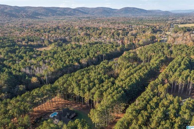 Discover your dream homesite on this expansive 2.35-acre estate on Pine Hill Country Club in Alabama - for sale on GolfHomes.com, golf home, golf lot
