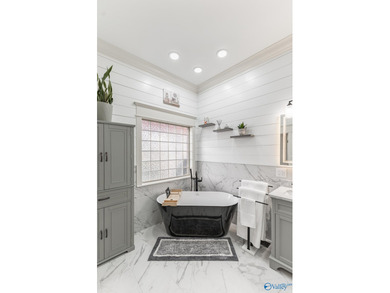 New Price. This luxury home overlooks the #4 fairway of on Canebrake Golf Club in AL - for sale on GolfHomes.com, golf home, golf lot