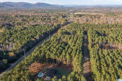 Discover your dream homesite on this expansive 2.35-acre estate on Pine Hill Country Club in Alabama - for sale on GolfHomes.com, golf home, golf lot