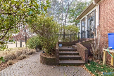 New Price. This luxury home overlooks the #4 fairway of on Canebrake Golf Club in AL - for sale on GolfHomes.com, golf home, golf lot