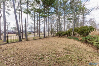 New Price. This luxury home overlooks the #4 fairway of on Canebrake Golf Club in AL - for sale on GolfHomes.com, golf home, golf lot