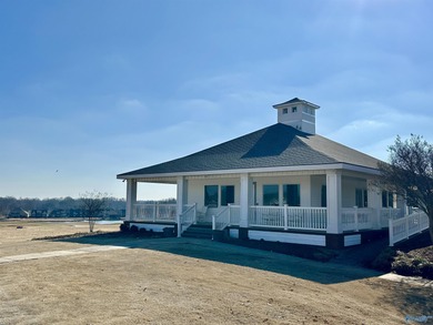 New Price. This luxury home overlooks the #4 fairway of on Canebrake Golf Club in AL - for sale on GolfHomes.com, golf home, golf lot
