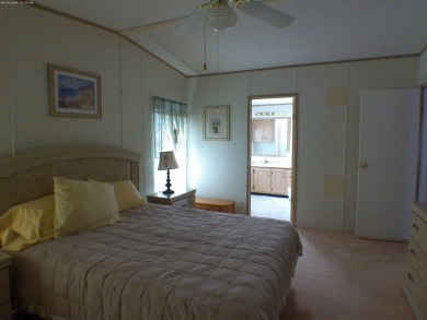 Furnished 2 bedroom, 2 bath home in Whisperwood. Inside you will on Whisperwood Golf Course in Florida - for sale on GolfHomes.com, golf home, golf lot