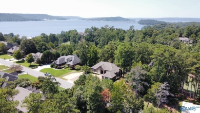 CUSTOM BUILT LAKE VIEW HOME WITH VIEW OF THE #6 FAIRWAY POND AND on Gunters Landing in Alabama - for sale on GolfHomes.com, golf home, golf lot