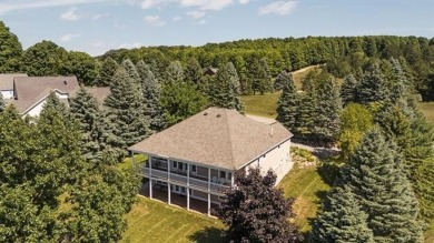 Welcome to your dream retreat at 5668 Golf Meadows Drive in on Shanty Creek Golf Course in Michigan - for sale on GolfHomes.com, golf home, golf lot