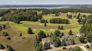 Welcome to your dream retreat at 5668 Golf Meadows Drive in on Shanty Creek Golf Course in Michigan - for sale on GolfHomes.com, golf home, golf lot