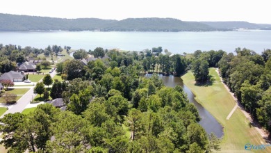 CUSTOM BUILT LAKE VIEW HOME WITH VIEW OF THE #6 FAIRWAY POND AND on Gunters Landing in Alabama - for sale on GolfHomes.com, golf home, golf lot