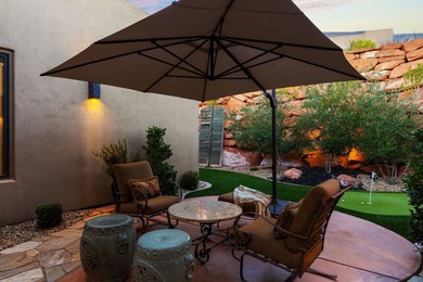 This gorgeous home blends indoors and outdoors with the many on Entrada at Snow Canyon in Utah - for sale on GolfHomes.com, golf home, golf lot